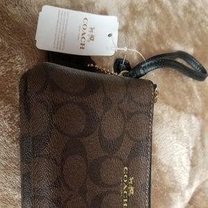 Coach brown wristlet